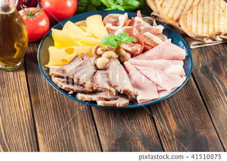 Cold meat platter with ham, prosciutto and other Cold meat platter with ham, prosciutto and other 41510875