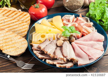 Cold meat platter with ham, prosciutto and other Cold meat platter with ham, prosciutto and other 41510887