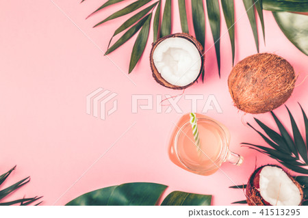 Coconut water and coconuts on pastel background. Coconut water and coconuts on pastel background. 41513295