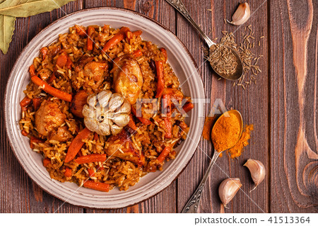 Pilaf (biryani) on a wooden background 41513364