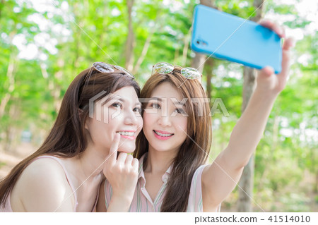 two beauty women selfie happily two beauty women selfie happily 41514010