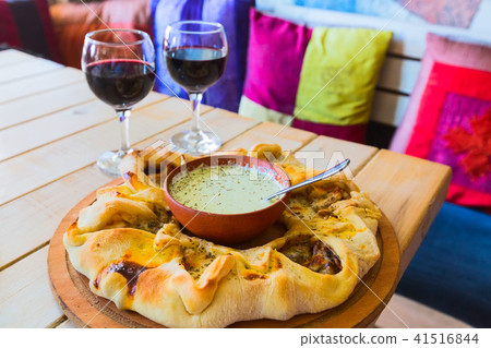 Traditional Georgian adjara pie and wine Traditional Georgian adjara pie and wine 41516844