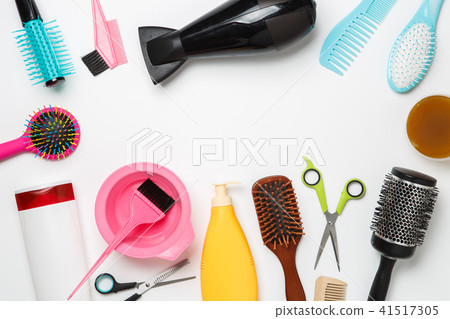 Image of accessories hairdresser, hair dryer, comb, hair bands isolated on white background. 41517305