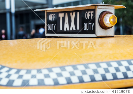 old retro taxi on the streets waiting  41519078