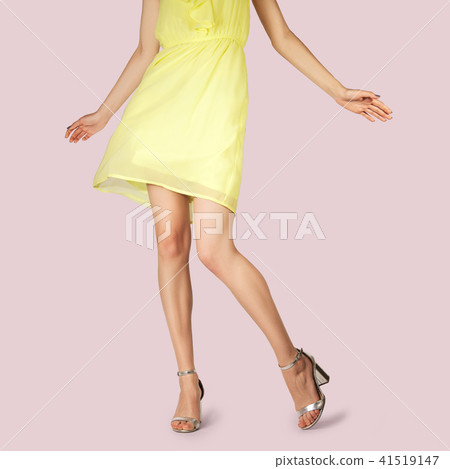 Legs of beautiful girl with short lifted dress. Legs of beautiful girl with short lifted dress. 41519147
