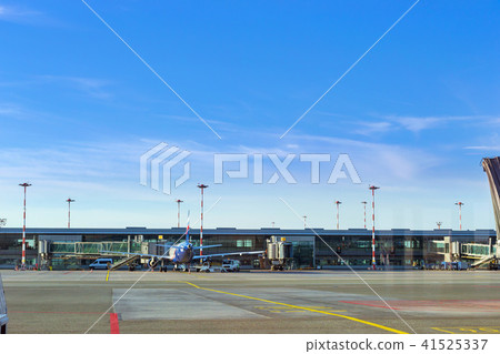 Airplane at stationary terminal gates airport Riga 41525337