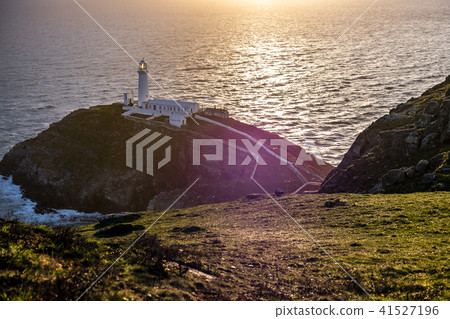 Dramatic sky above the historic South Stack Lighthouse - Isle of Anglesey North wales UK Dramatic sky above the historic South Stack Lighthouse - Isle of Anglesey North wales UK 41527196