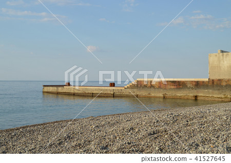 Sunrise at the sea, pier on the shore in the early morning, calm, relax Sunrise at the sea, pier on the shore in the early morning, calm, relax 41527645