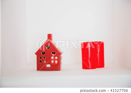 red ceramic house and candles red ceramic house and candles 41527708
