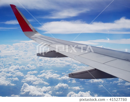 crop view of a white silver metallic airplane wing 41527780