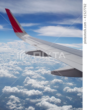 crop view of a white silver metallic airplane wing crop view of a white silver metallic airplane wing 41527782