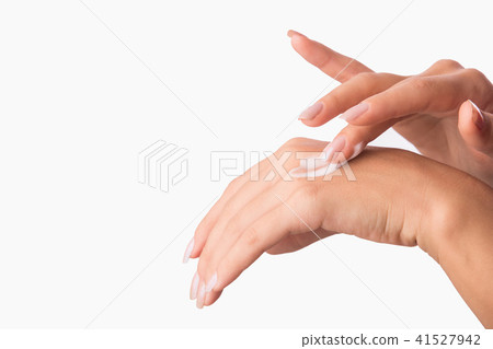 Hand skin care. woman applying cream for hands Hand skin care. woman applying cream for hands 41527942