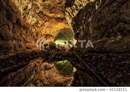 Underground lake in volcanic cave 41528551