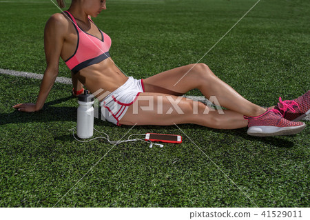 Fitness and diet concept background. Water bottle, smartphone, h Fitness and diet concept background. Water bottle, smartphone, h 41529011