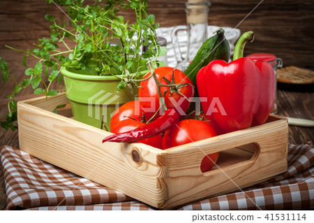 Vegetables in a wooden box. 41531114