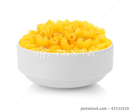 dry macaroni in a bowl on white background 41533529