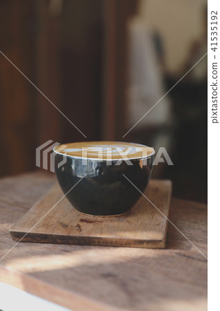 Cappuccino coffee break on wood background 41535192