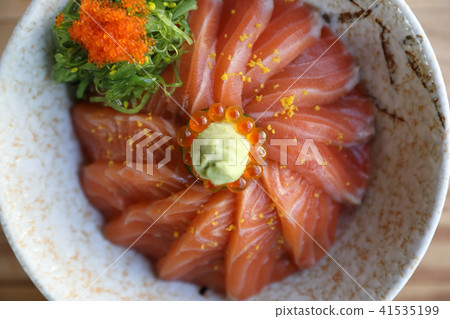 Salmon sushi don on wood background , Japanese food 41535199
