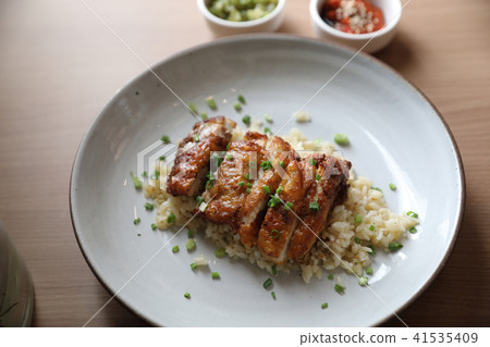 Nasi goreng fried rice with chicken on wood background 41535409