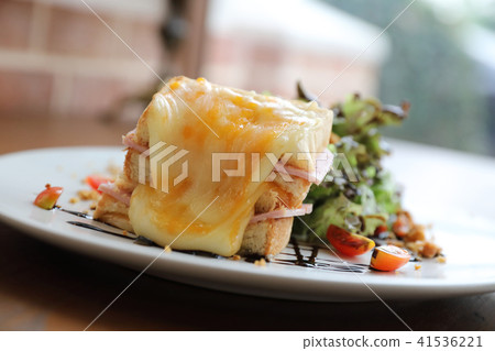 Ham cheese sandwich with salad on wood background Ham cheese sandwich with salad on wood background 41536221