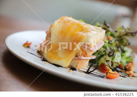 Ham cheese sandwich with salad on wood background 41536225