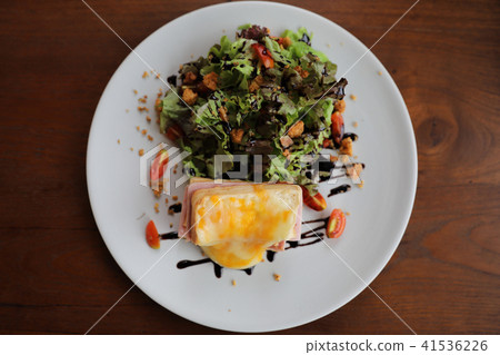 Ham cheese sandwich with salad on wood background Ham cheese sandwich with salad on wood background 41536226