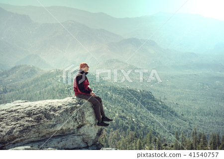 Man on the cliff Man on the cliff 41540757