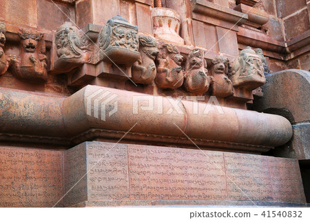 Inscriptions in elegant Chola Grantha and Tamil letters on the northern side of the base 41540832