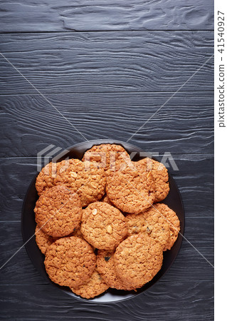 Oatmeal raisin and peanut Cookies, top view Oatmeal raisin and peanut Cookies, top view 41540927