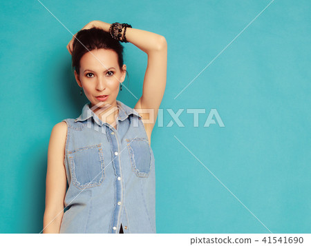 Summer fashion. Portrait of girl in jeans shirt. Summer fashion. Portrait of girl in jeans shirt. 41541690