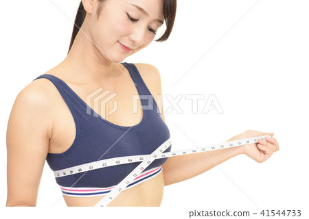 A woman measuring the chest A woman measuring the chest 41544733