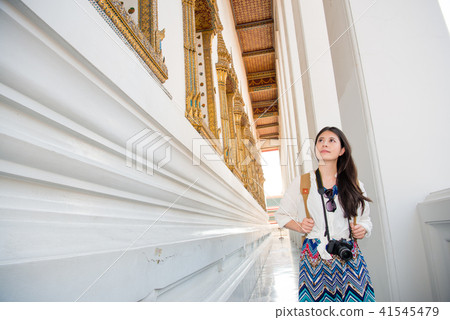 female tourist sightseeing in Thailand temple female tourist sightseeing in Thailand temple 41545479