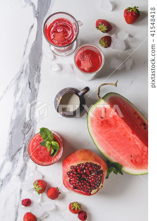 Red fruit cocktails or smoothies Red fruit cocktails or smoothies 41548418