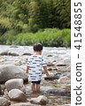 Behind a boy playing in a river 41548855