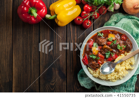 Hungarian beef goulash serwed with galuska noodles 41550735
