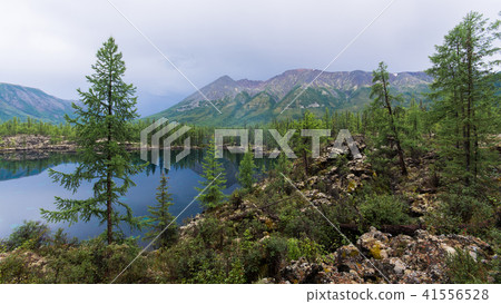 Beautiful summer Landscape with a high-mountain lake. Majestic wild nature in Russia, Eastern Sayan. Beautiful summer Landscape with a high-mountain lake. Majestic wild nature in Russia, Eastern Sayan. 41556528