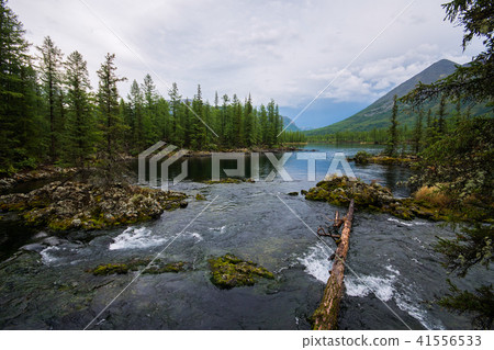 Wonderful lake wide panorama. Scenic summer landscape, mountains and blue cloudy sky at background Wonderful lake wide panorama. Scenic summer landscape, mountains and blue cloudy sky at background 41556533