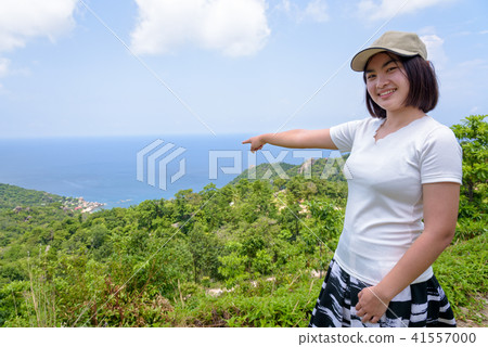 Women tourist on viewpoint at Koh Tao Women tourist on viewpoint at Koh Tao 41557000