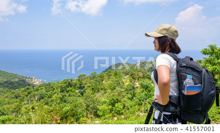 Women tourist on viewpoint at Koh Tao Women tourist on viewpoint at Koh Tao 41557001