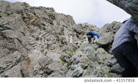 At the end of the ladder at the summit of Mt. Igaragadake that is steepening At the end of the ladder at the summit of Mt. Igaragadake that is steepening 41557958