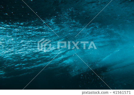 Underwater barrel wave and surfer in tropical sea Underwater barrel wave and surfer in tropical sea 41561571