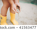 Children's playing in the sand 41563477