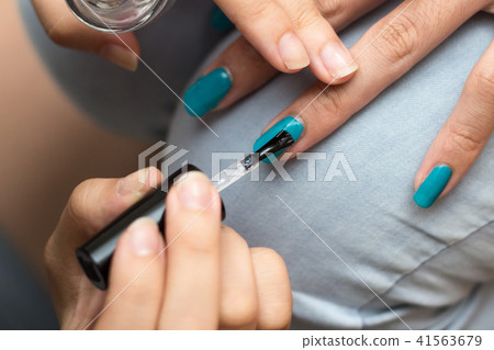 Blue nail polish Blue nail polish 41563679