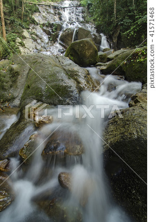 water stream and beautiful tropical waterfall water stream and beautiful tropical waterfall 41571468