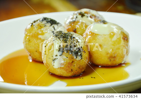 Takoyaki Japanese fried dumpling stuffed squid Takoyaki Japanese fried dumpling stuffed squid 41573634