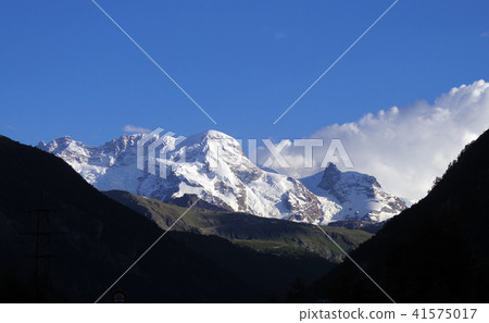 alps view in switzerland with beautiful cloud alps view in switzerland with beautiful cloud 41575017