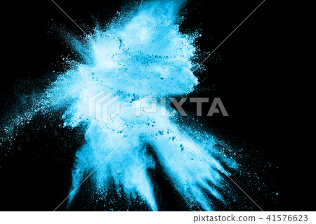 Launched blue dust particles splash on black backg 41576623