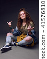 Happy hippy girl, studio shot 41576810