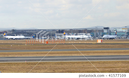 FRANKFURT, GERMANY - FEB 28th, 2015: Gate and terminal buildings at Frankfurt International Airport FRANKFURT, GERMANY - FEB 28th, 2015: Gate and terminal buildings at Frankfurt International Airport 41577109