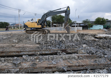 Backhoe loader was digging in the ground Backhoe loader was digging in the ground 41577179